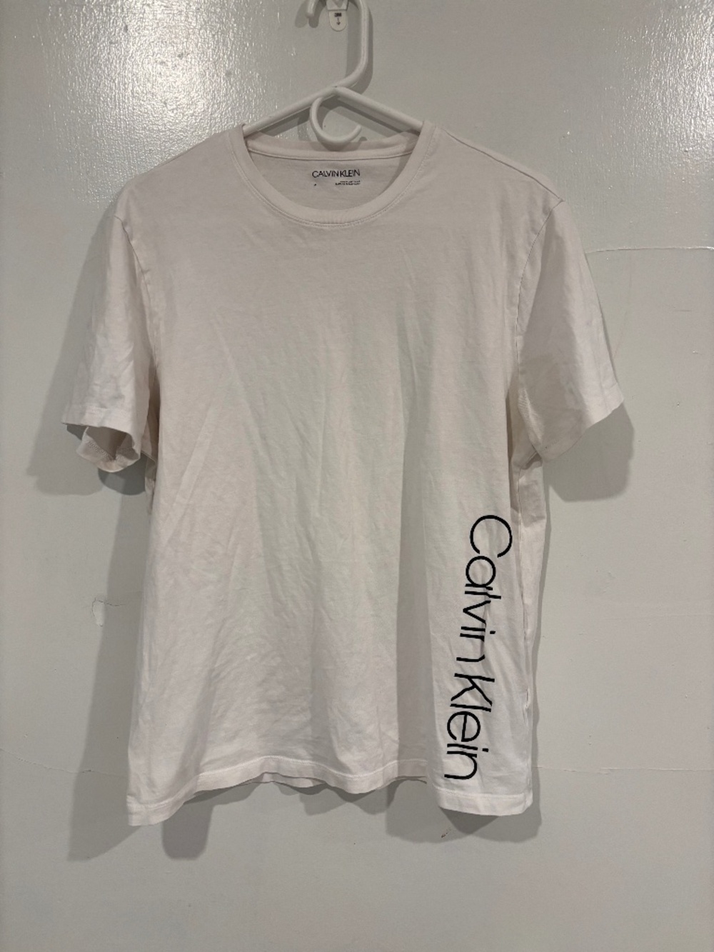 White womans Calvin Klein tshirt